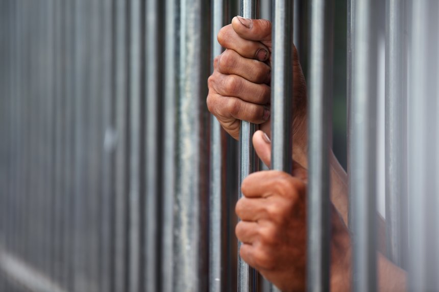 hand in jail