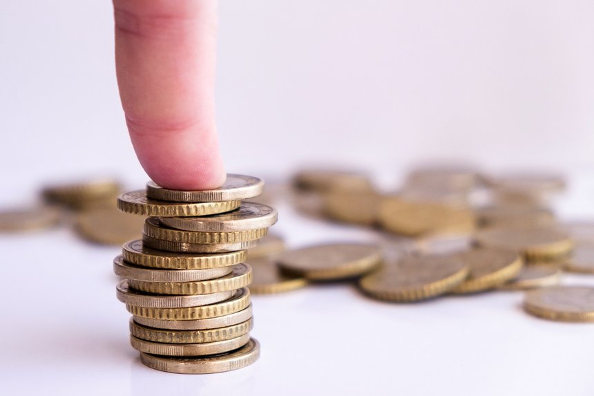 Euro coins at a white background economy europe with copy space