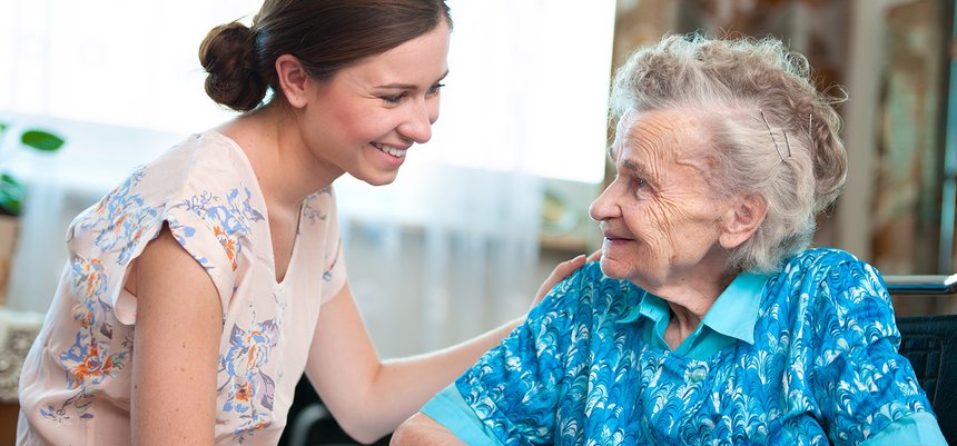 senior woman with home caregiver
