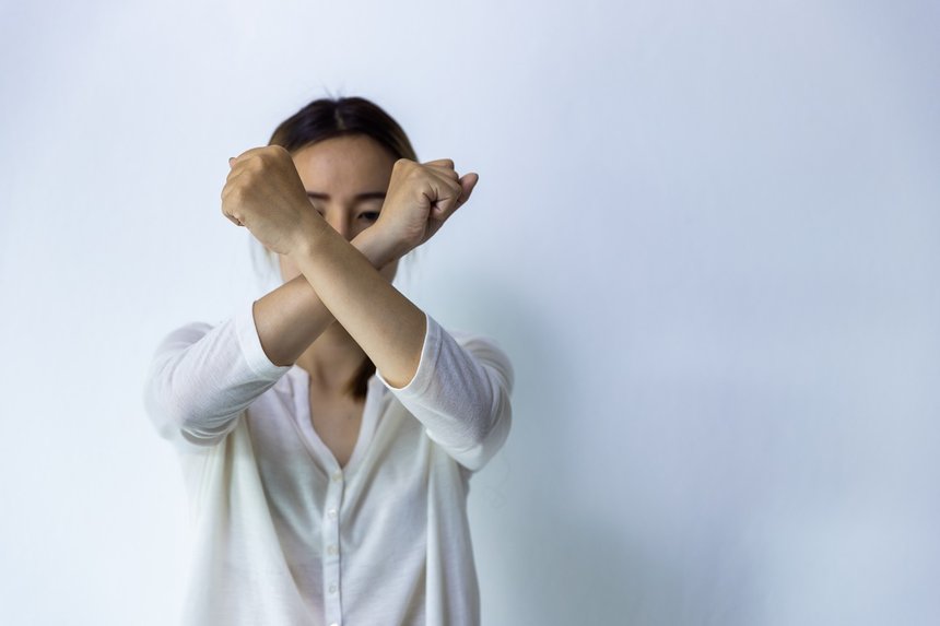 Woman raised her hand for dissuade, Sexual abuse , Stop violence