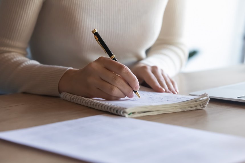 Businesswoman writing important data information creative startu