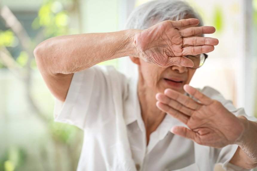 Asian old elderly woman raising hands in defence,resisting attack,victims of family domestic violence,physical mental abuse,mistreatment,harassment and assault in home,human rights violation concept