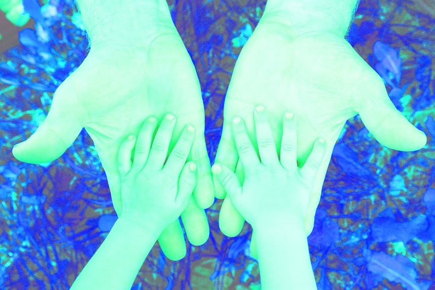 hands grandfather and grandson