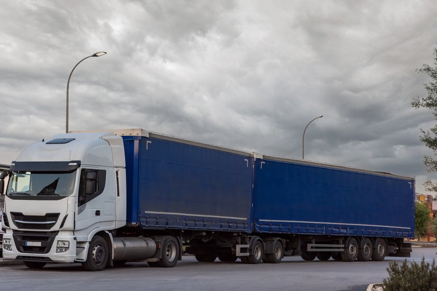 Mega truck or duo trailer, a set of a truck with two semi-trailers.