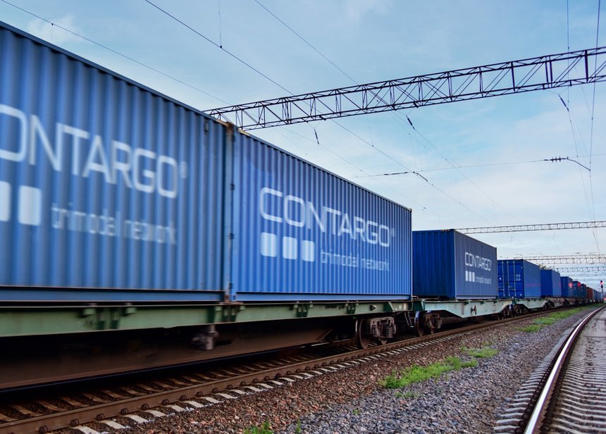Cargo Containers Transportation On Freight Train By Railway. Int